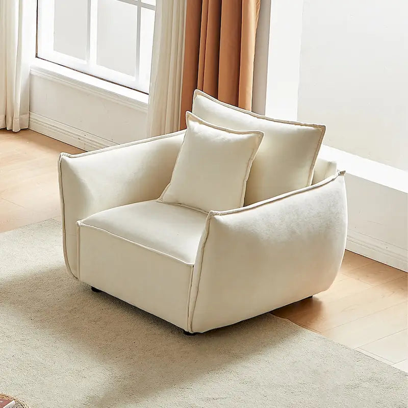 Fauteuil rembourré avec coussins 44